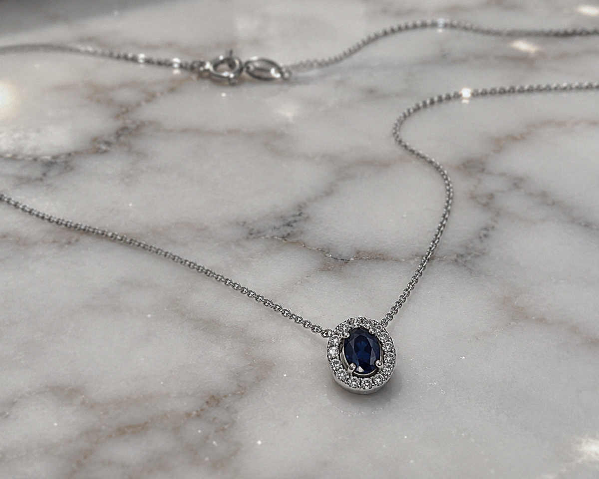 Blue Sapphire & Diamond Cluster Pendant in 9ct White Gold