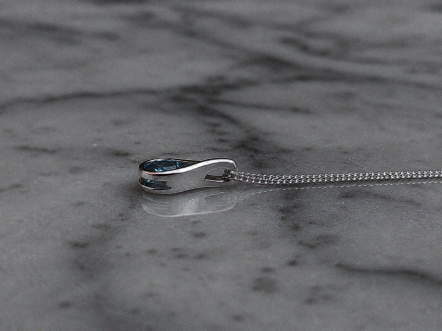 Sterling Silver Blue Topaz Teardrop Pendant Necklace