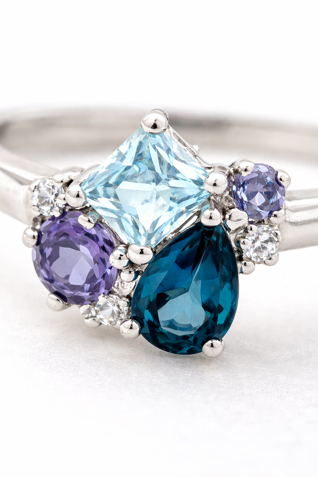 9ct White Gold Blue Topaz, Iolite & Diamond Cluster Ring
