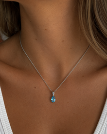 9ct White Gold Swiss Blue Topaz Oval Pendant Necklace