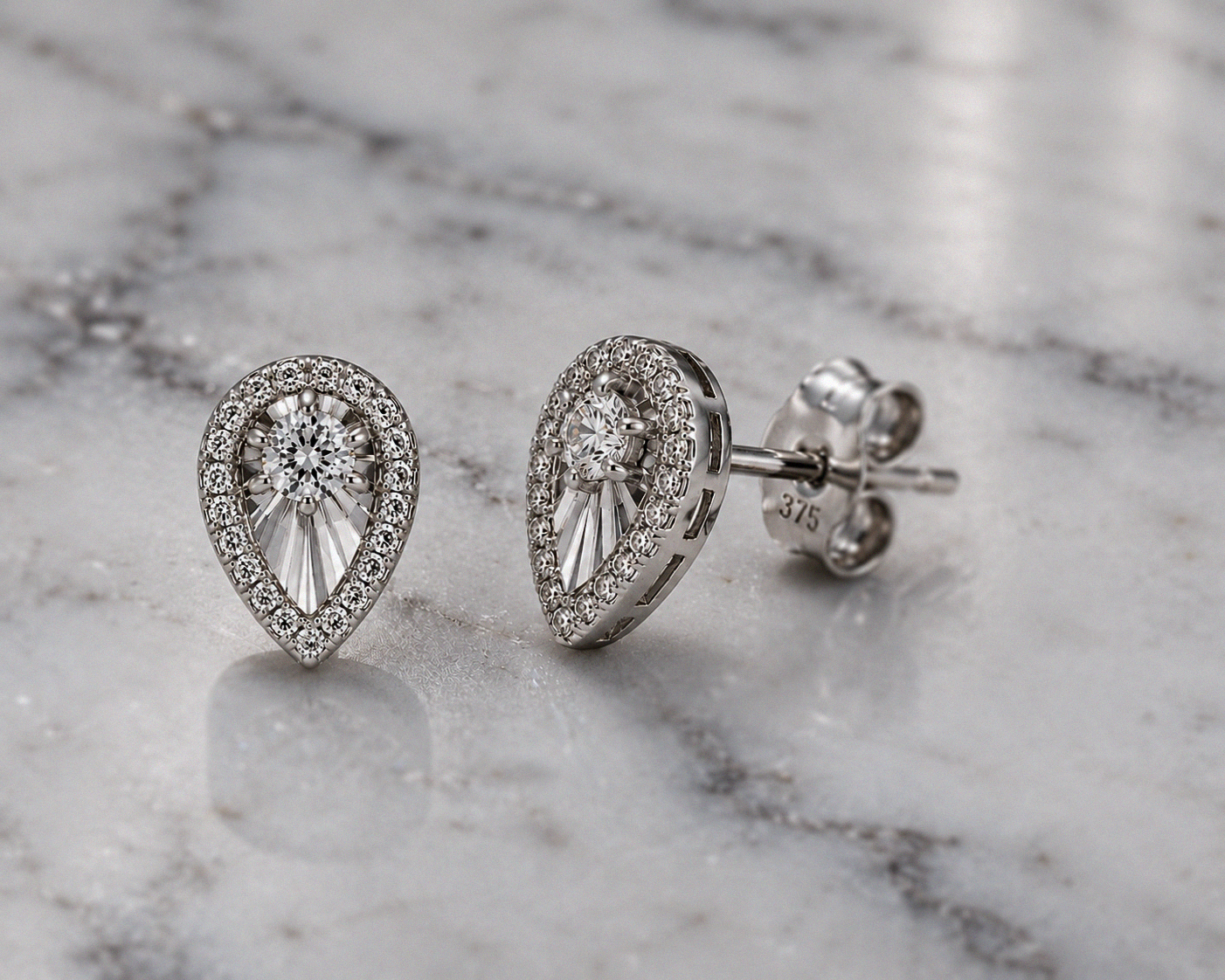 9ct White Gold Teardrop Diamond Stud Earrings (0.12ct)