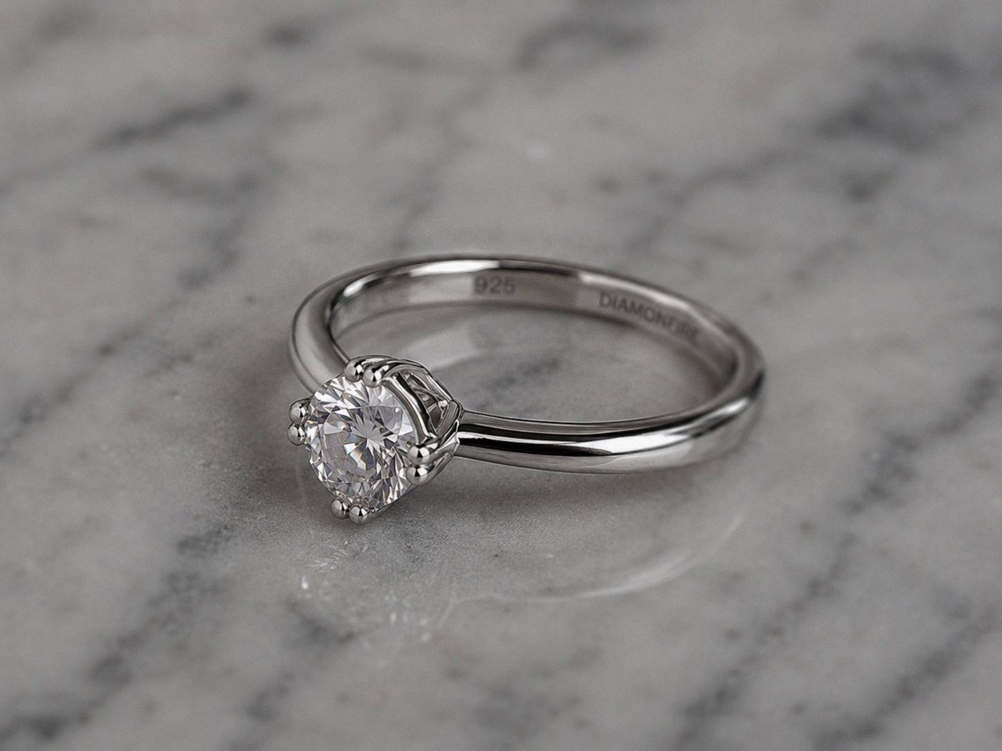 Sterling Silver Double Claw Solitaire Ring with DiamondFire® CZ