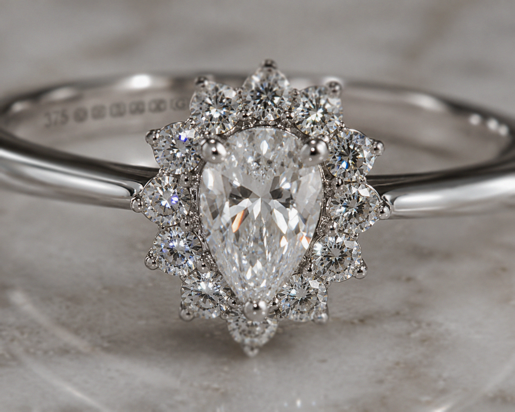 9ct White Gold 0.35ct Pear-Cut Flower Halo Diamond Engagement Ring