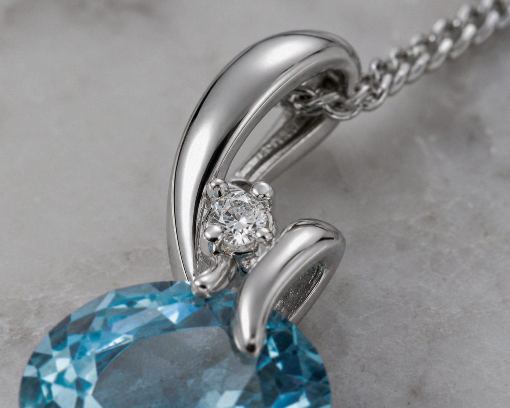 Blue Topaz & Diamond Twist Pendant on 9ct Gold