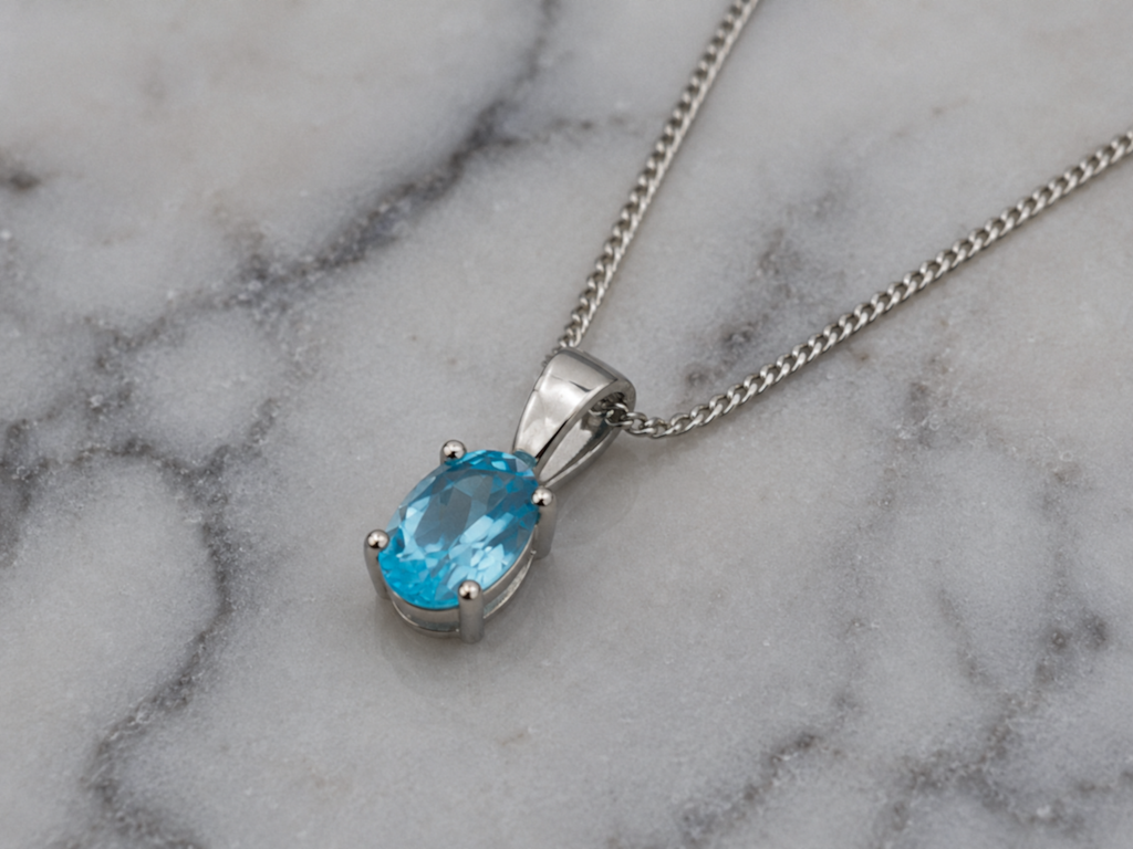 9ct White Gold Swiss Blue Topaz Oval Pendant Necklace