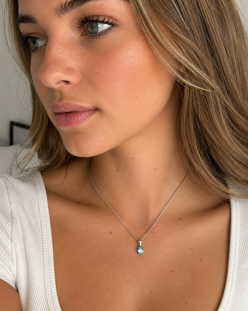 9ct White Gold Swiss Blue Topaz Oval Pendant Necklace