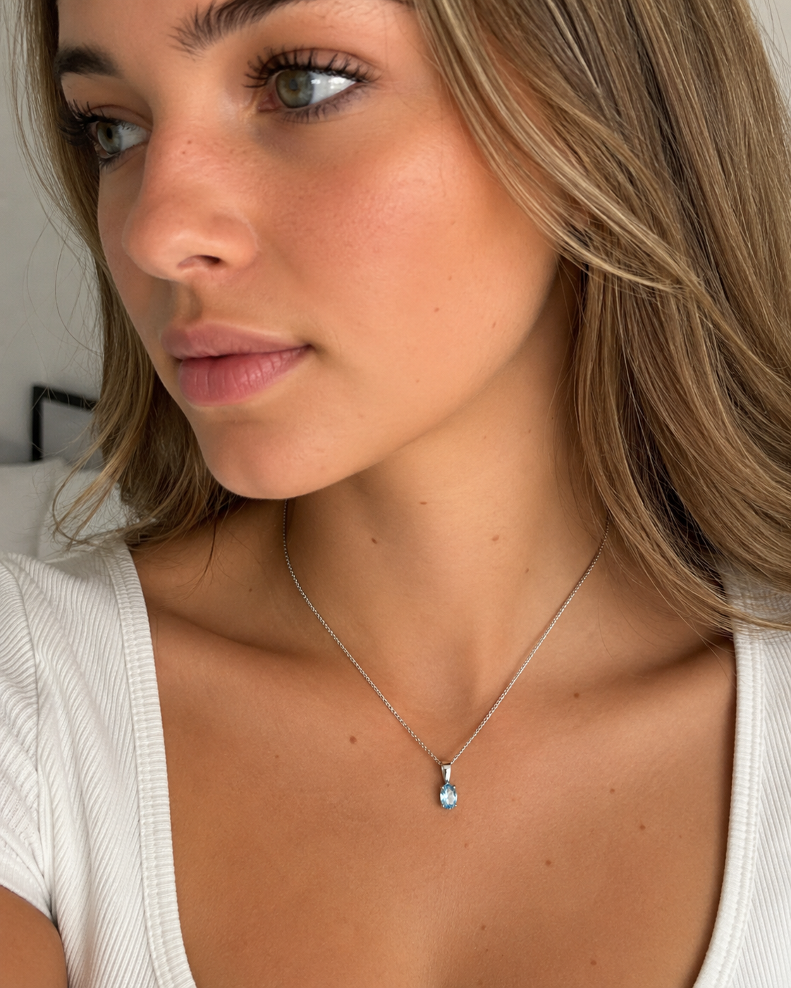9ct White Gold Swiss Blue Topaz Oval Pendant Necklace