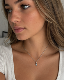 9ct White Gold Swiss Blue Topaz Oval Pendant Necklace