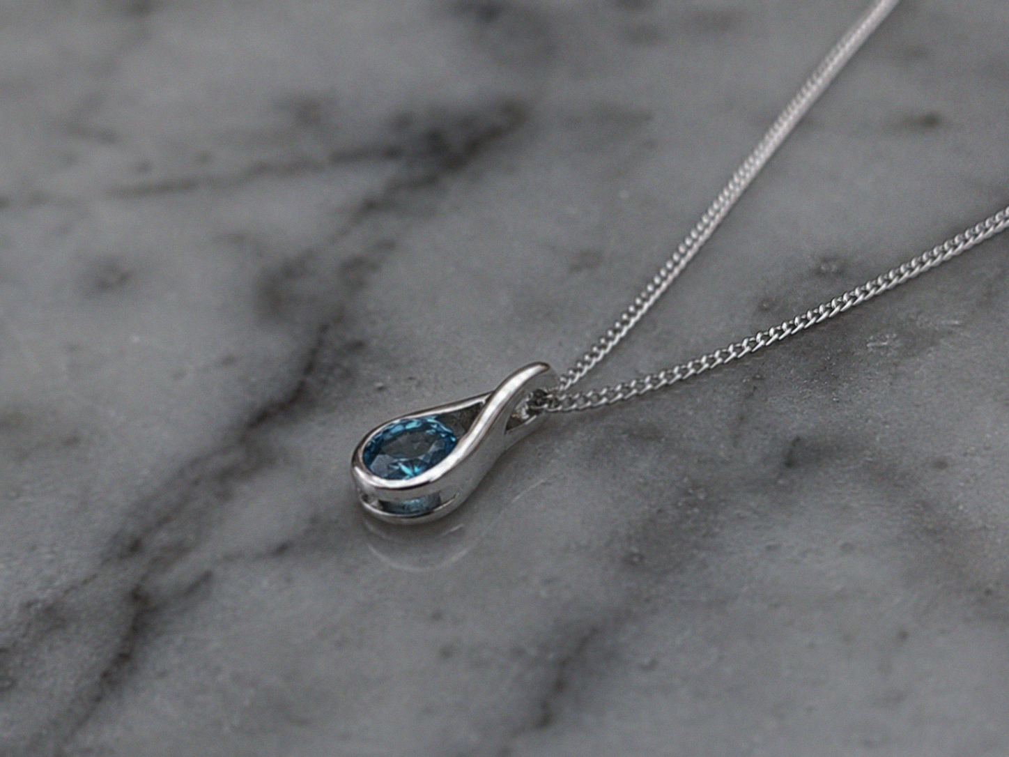 Sterling Silver Blue Topaz Teardrop Pendant Necklace