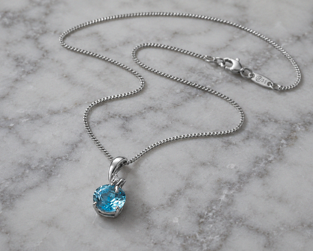 Blue Topaz & Diamond Twist Pendant on 9ct Gold