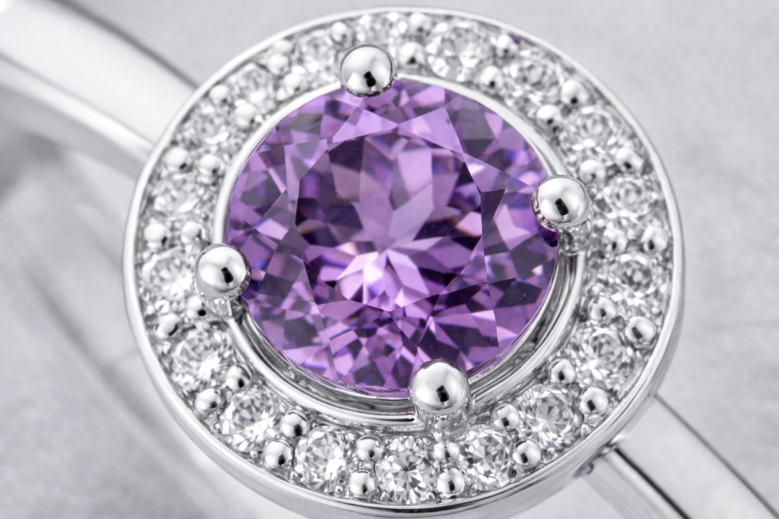 9ct White Gold Sapphire & Diamond Halo Ring – 0.07ct Diamonds