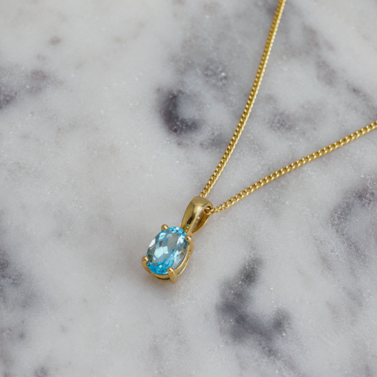 9ct Yellow Gold Swiss Blue Topaz Oval Pendant Necklace