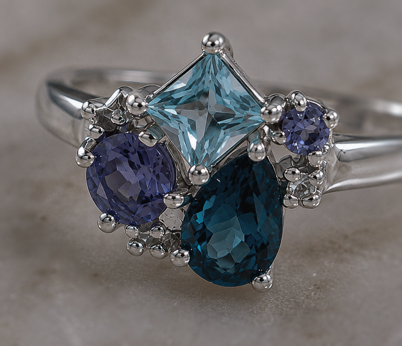 9ct White Gold Blue Topaz, Iolite & Diamond Cluster Ring