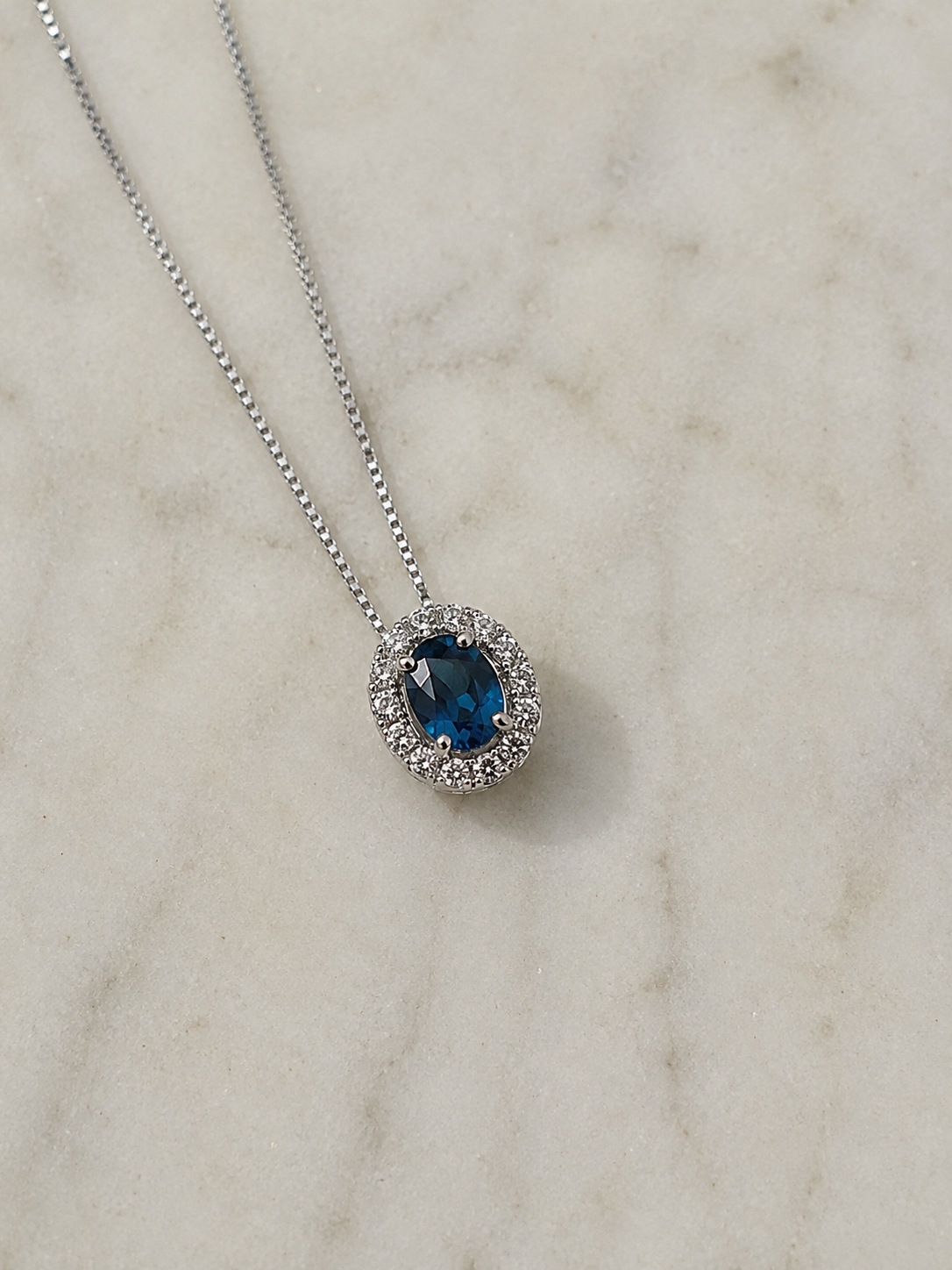 Blue Sapphire & Diamond Cluster Pendant in 9ct White Gold