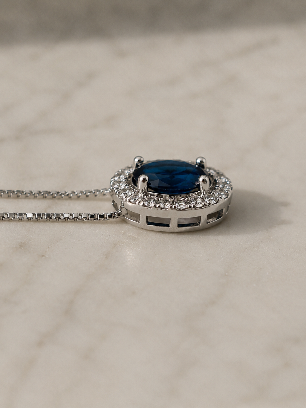 Blue Sapphire & Diamond Cluster Pendant in 9ct White Gold
