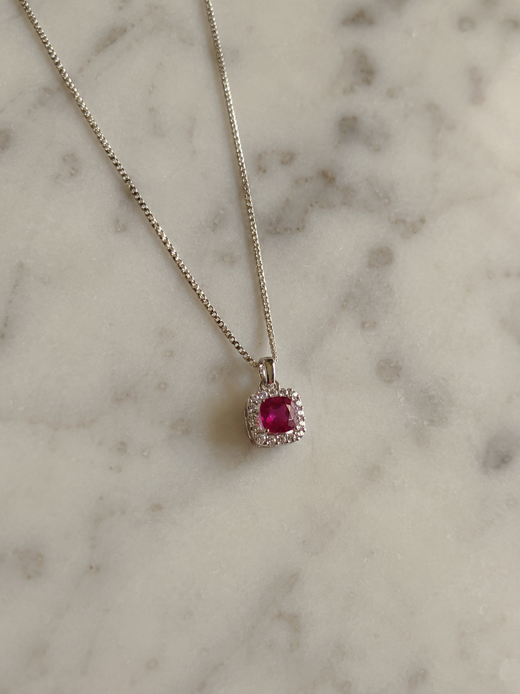 Cushion Cut Ruby & Diamond Halo Pendant Necklace in 9ct White Gold