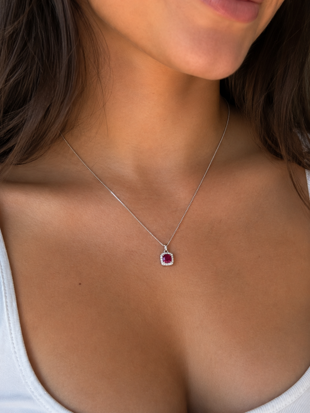 Cushion Cut Ruby & Diamond Halo Pendant Necklace in 9ct White Gold