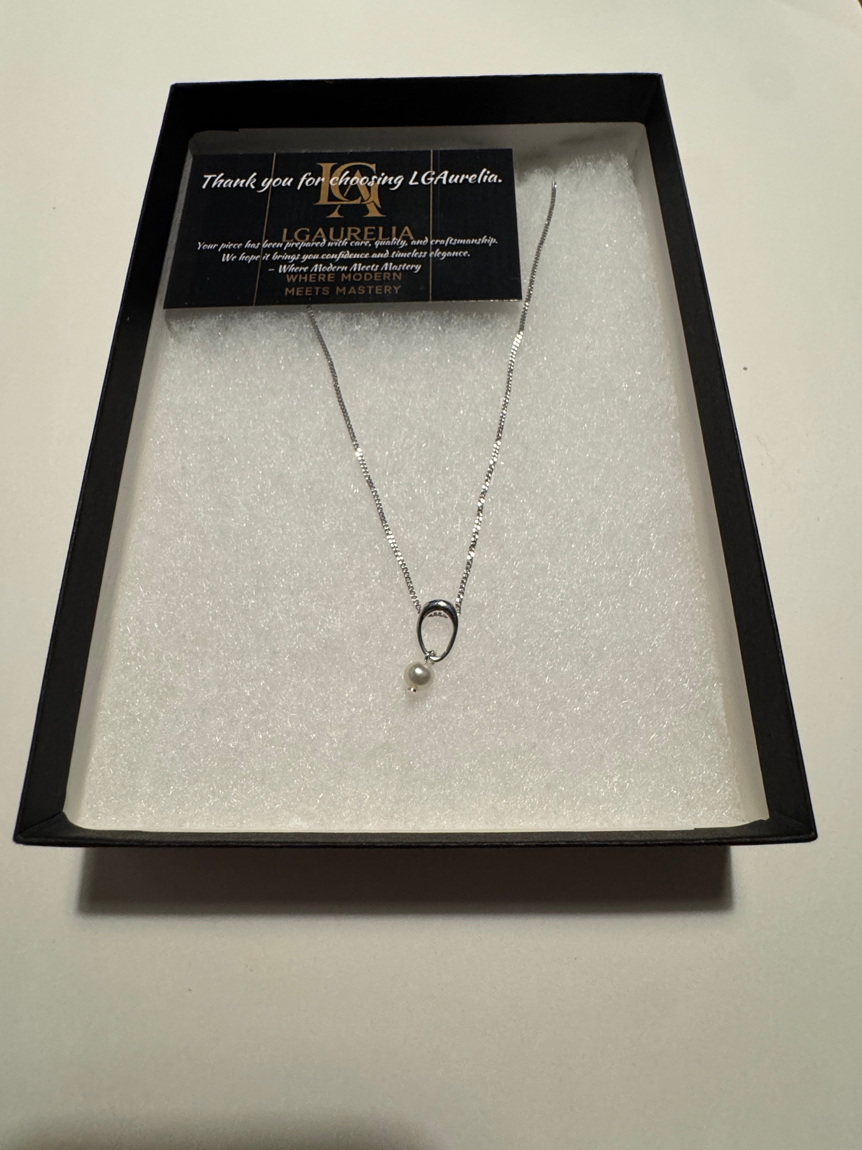 Sterling Silver Open Oval Freshwater Pearl Pendant Necklace – Rhodium Plated