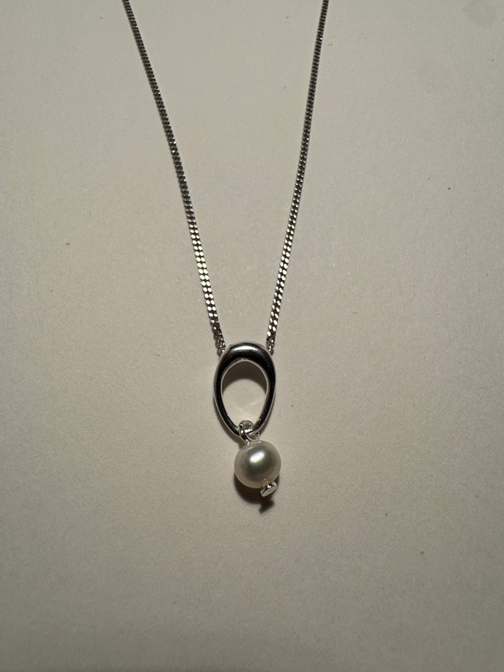 Sterling Silver Open Oval Freshwater Pearl Pendant Necklace – Rhodium Plated