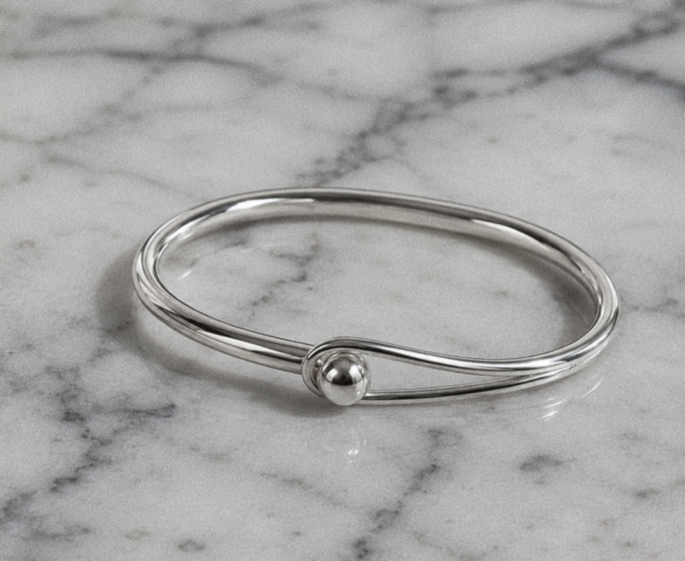 Sterling Silver Oval Bangle with Feature Ball Clasp