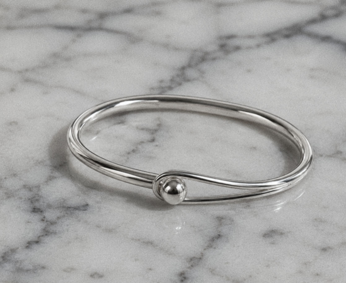 Sterling Silver Oval Bangle with Feature Ball Clasp