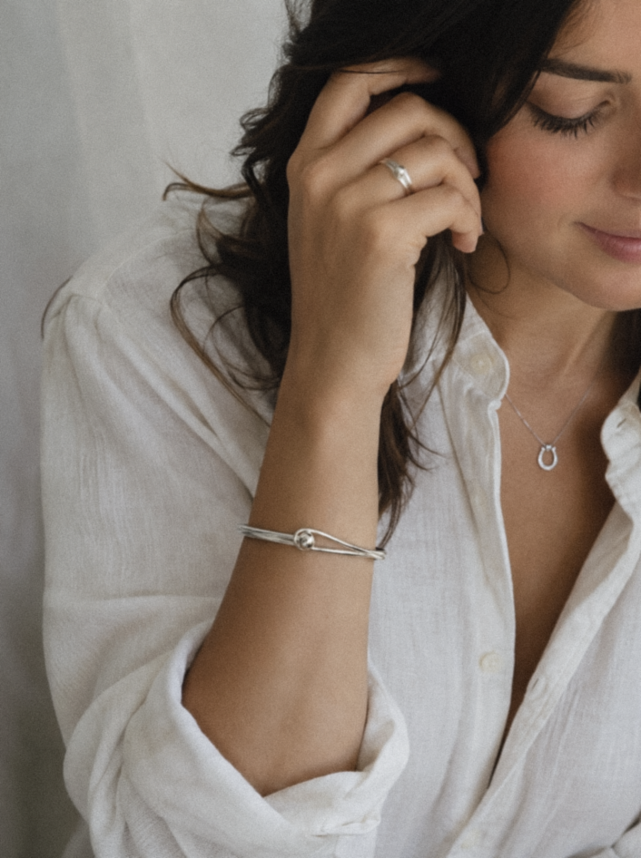 Sterling Silver Oval Bangle with Feature Ball Clasp