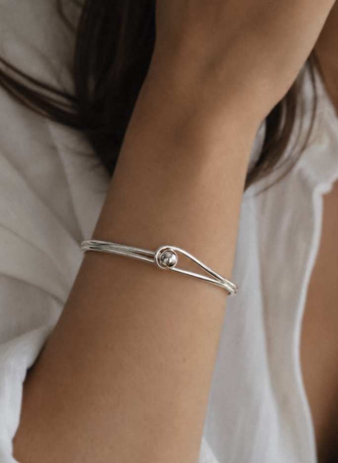 Sterling Silver Oval Bangle with Feature Ball Clasp