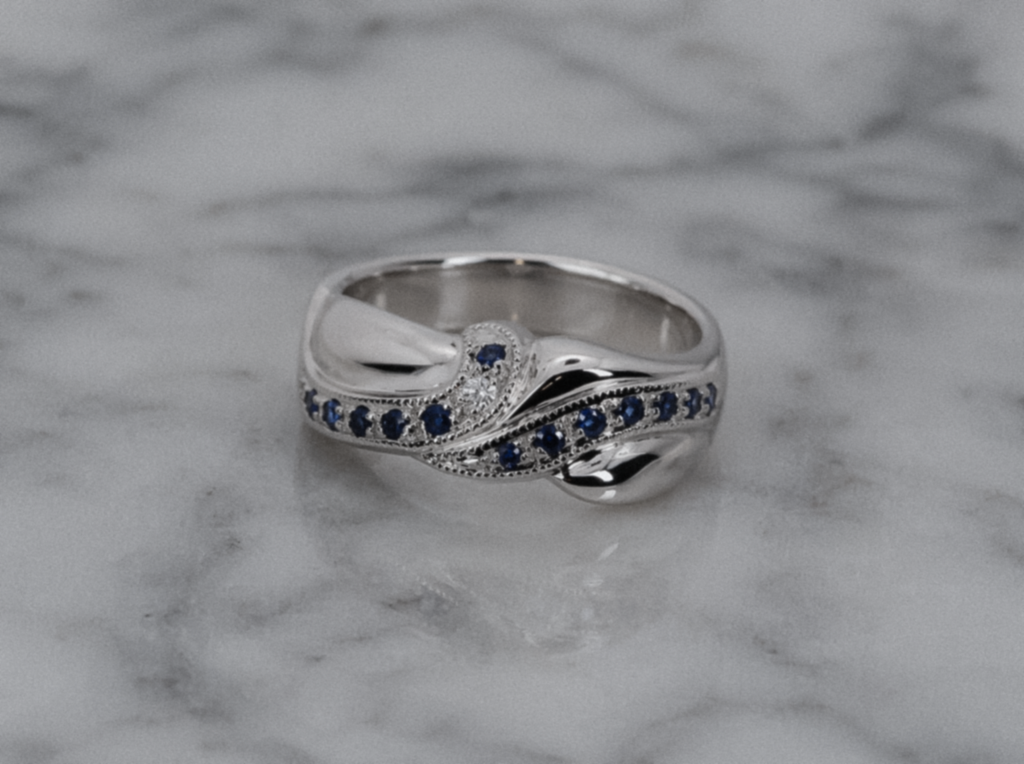 9ct White Gold Blue Sapphire & Diamond Twist Eternity Ring