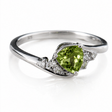 9ct White Gold Trillion Peridot & White Topaz Ring