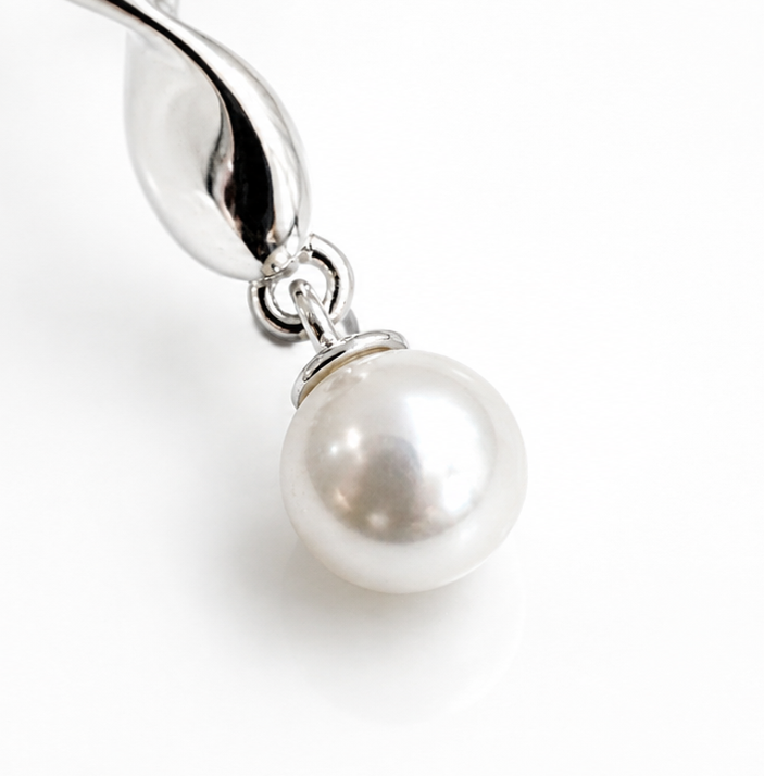 Sterling Silver Twisted Pear Drop Earrings