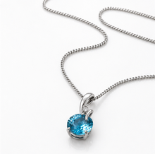Blue Topaz & Diamond Twist Pendant on 9ct Gold