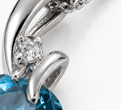 Blue Topaz & Diamond Twist Pendant on 9ct Gold