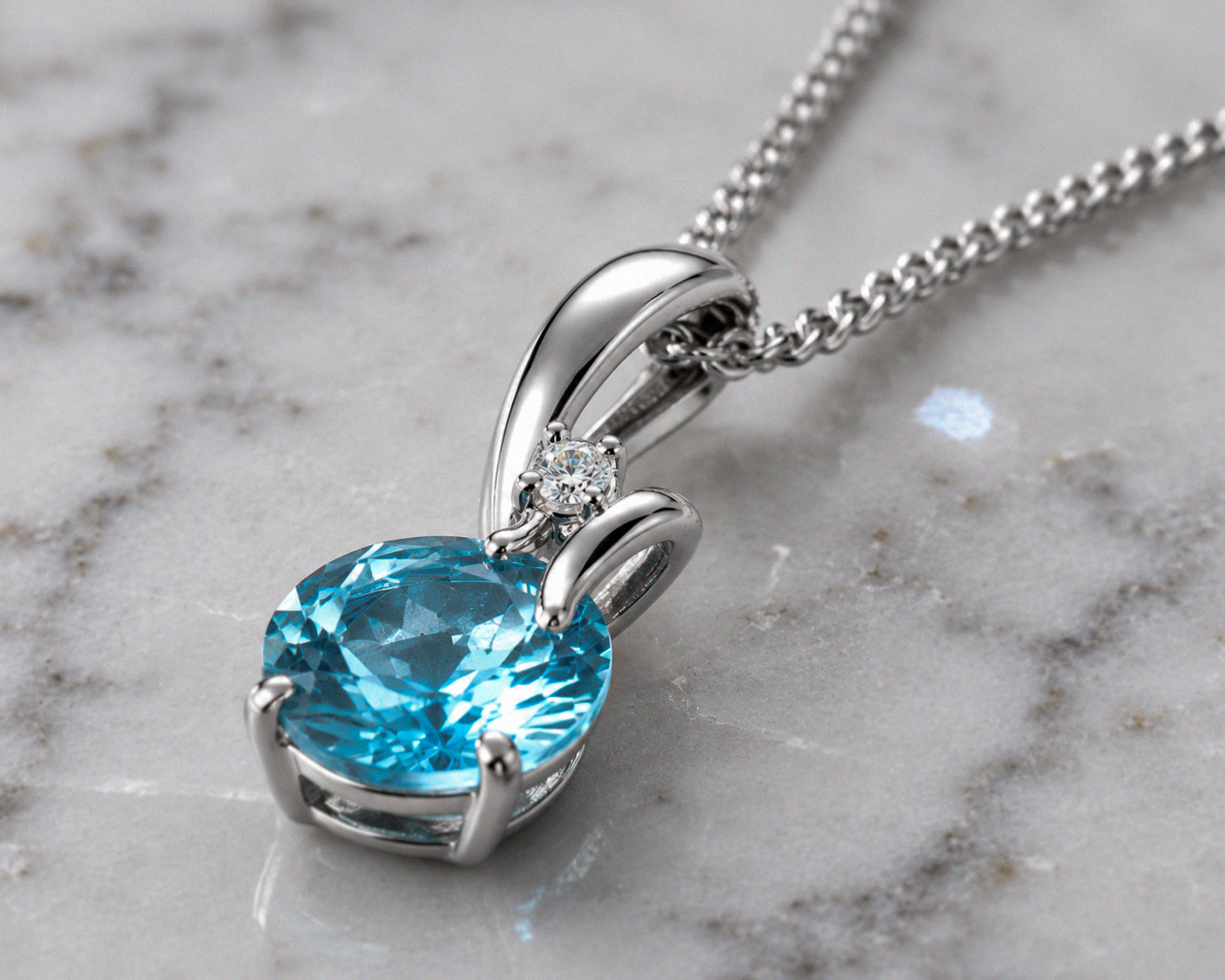 Blue Topaz & Diamond Twist Pendant on 9ct Gold