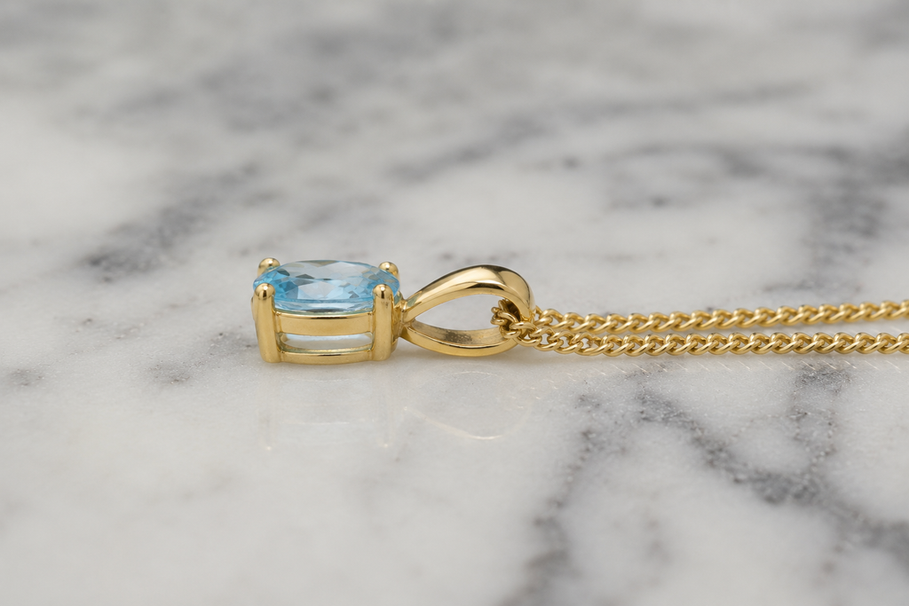 9ct Yellow Gold Swiss Blue Topaz Oval Pendant Necklace