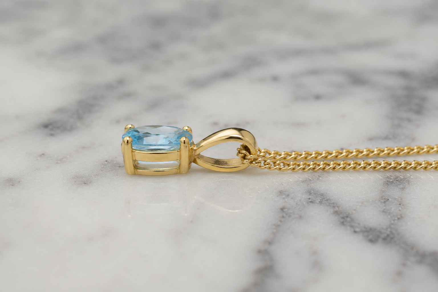 9ct Yellow Gold Swiss Blue Topaz Oval Pendant Necklace