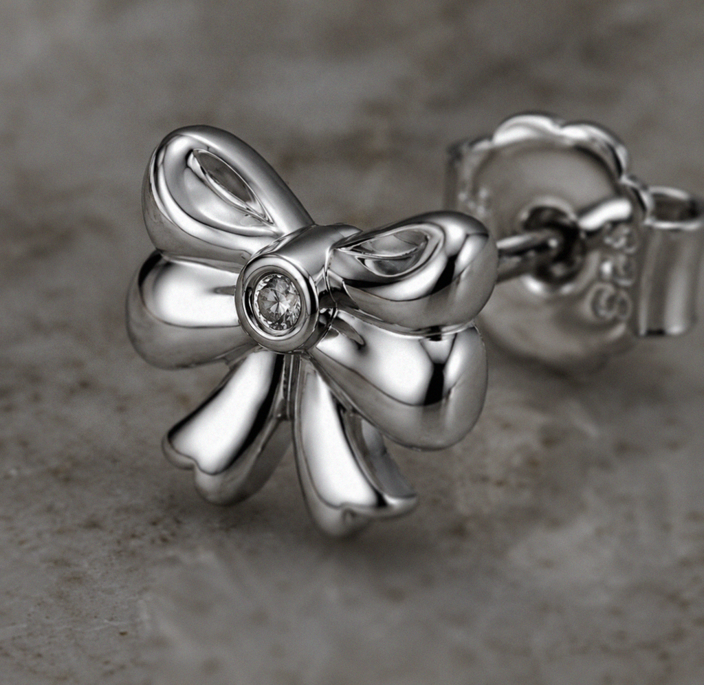 Diamond Bow Stud Earrings in Sterling Silver