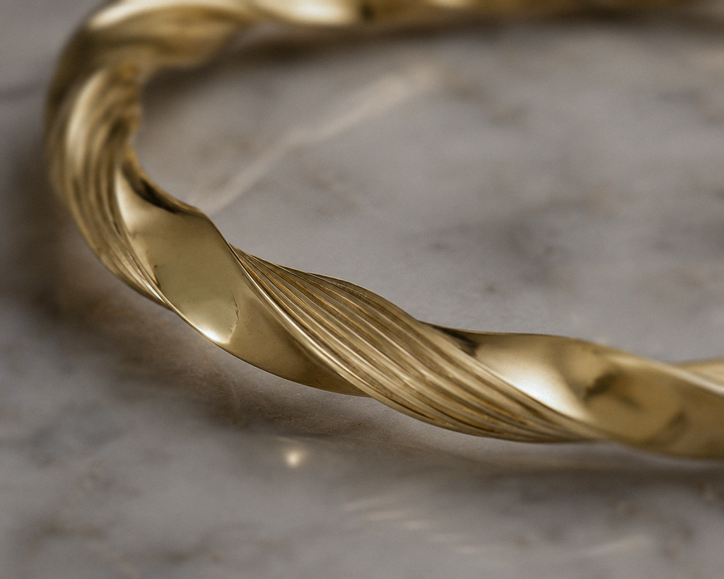 9ct Yellow Gold Sculpted Ribbed Twist Spring Bangle