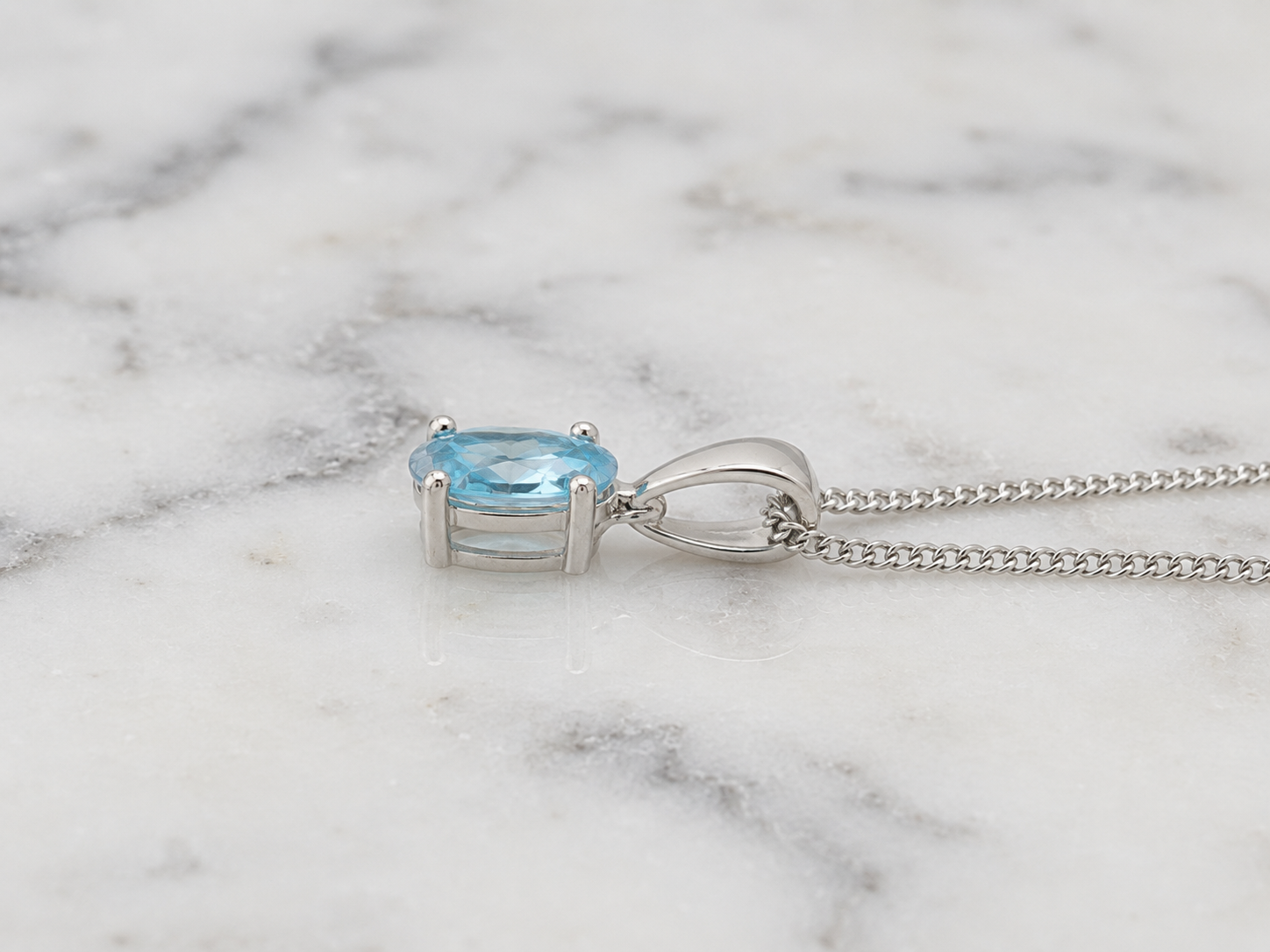 9ct White Gold Swiss Blue Topaz Oval Pendant Necklace