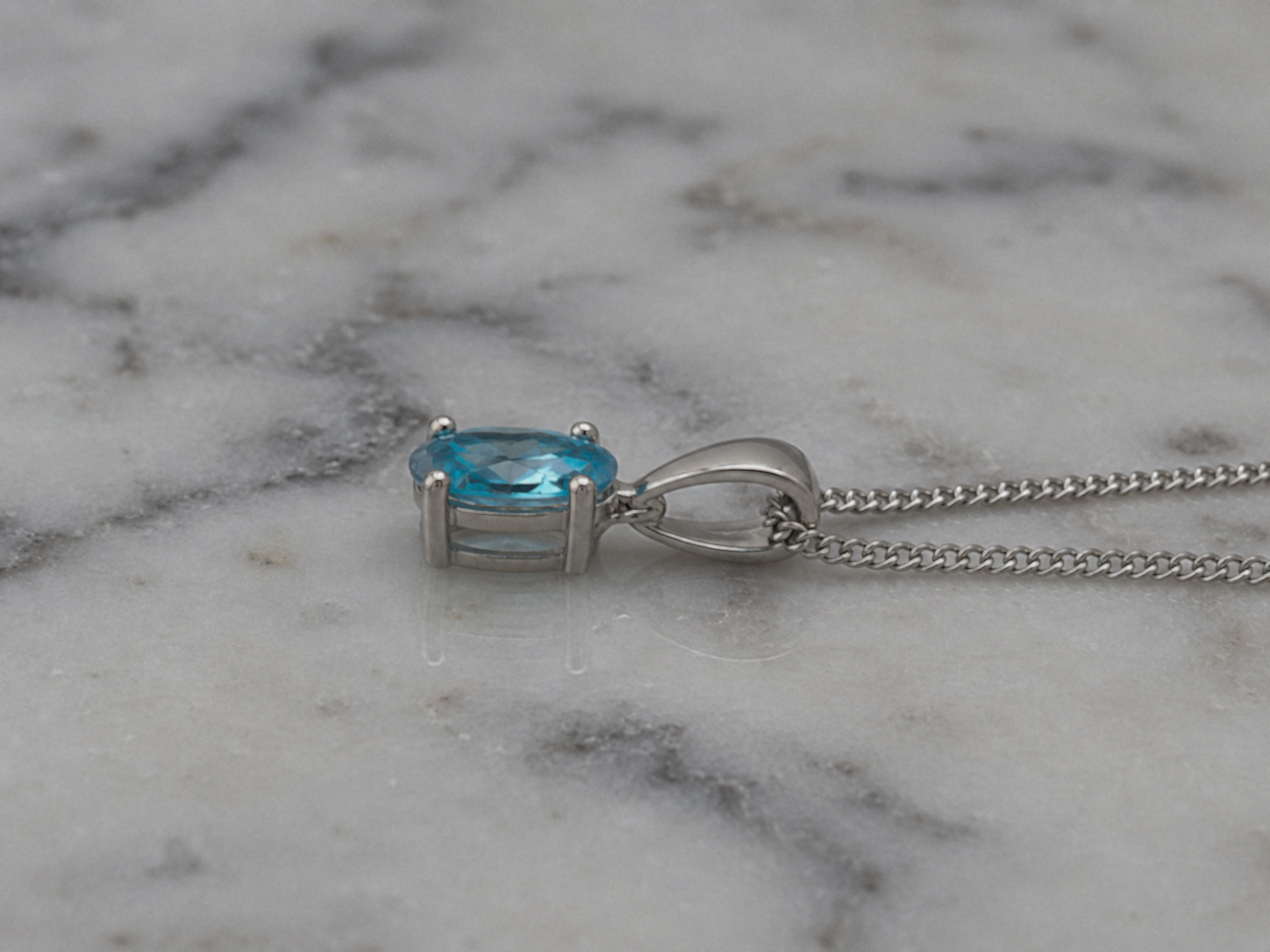 9ct White Gold Swiss Blue Topaz Oval Pendant Necklace
