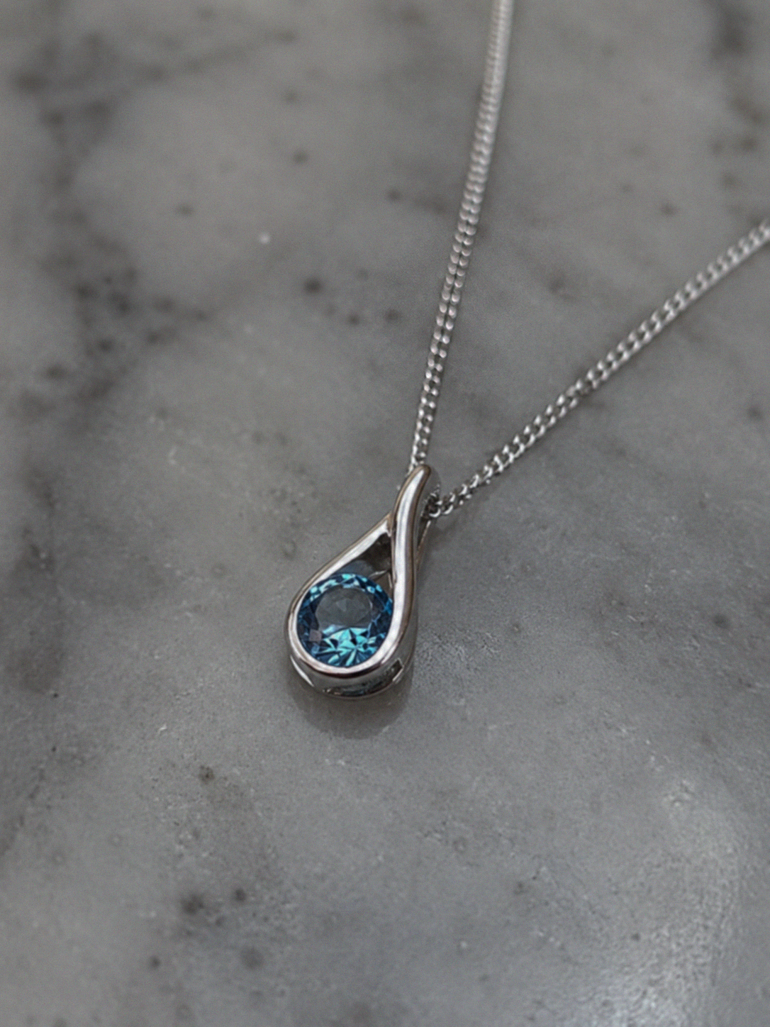 Sterling Silver Blue Topaz Teardrop Pendant Necklace