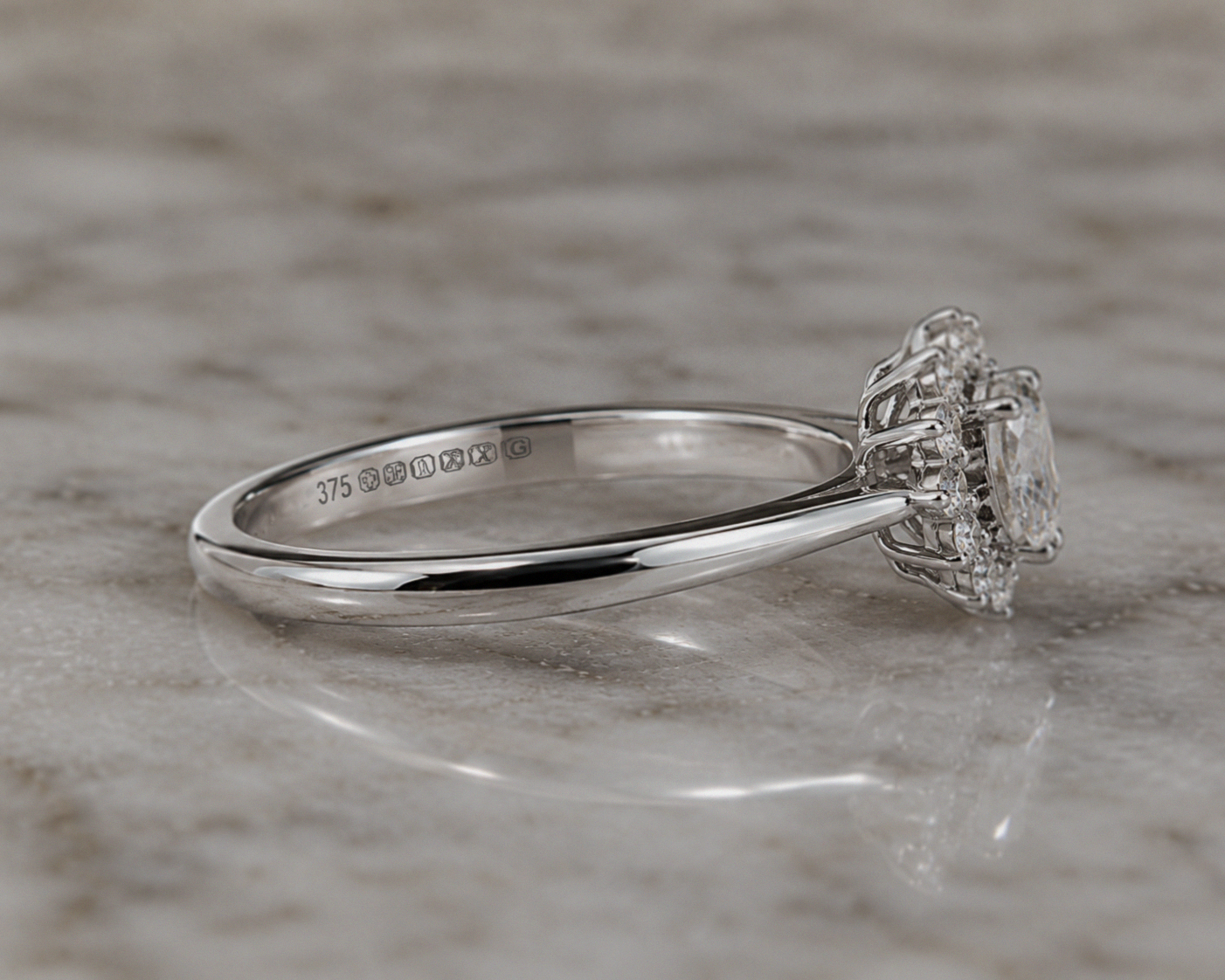 9ct White Gold 0.35ct Pear-Cut Flower Halo Diamond Engagement Ring