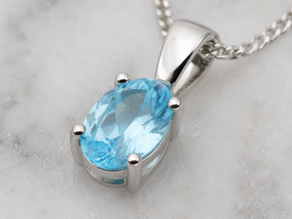 9ct White Gold Swiss Blue Topaz Oval Pendant Necklace
