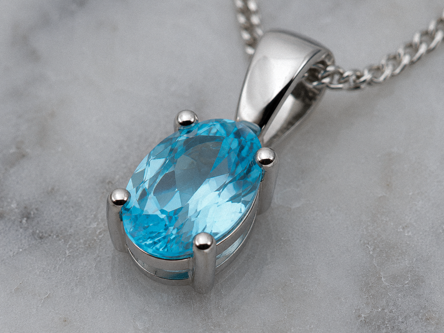 9ct White Gold Swiss Blue Topaz Oval Pendant Necklace
