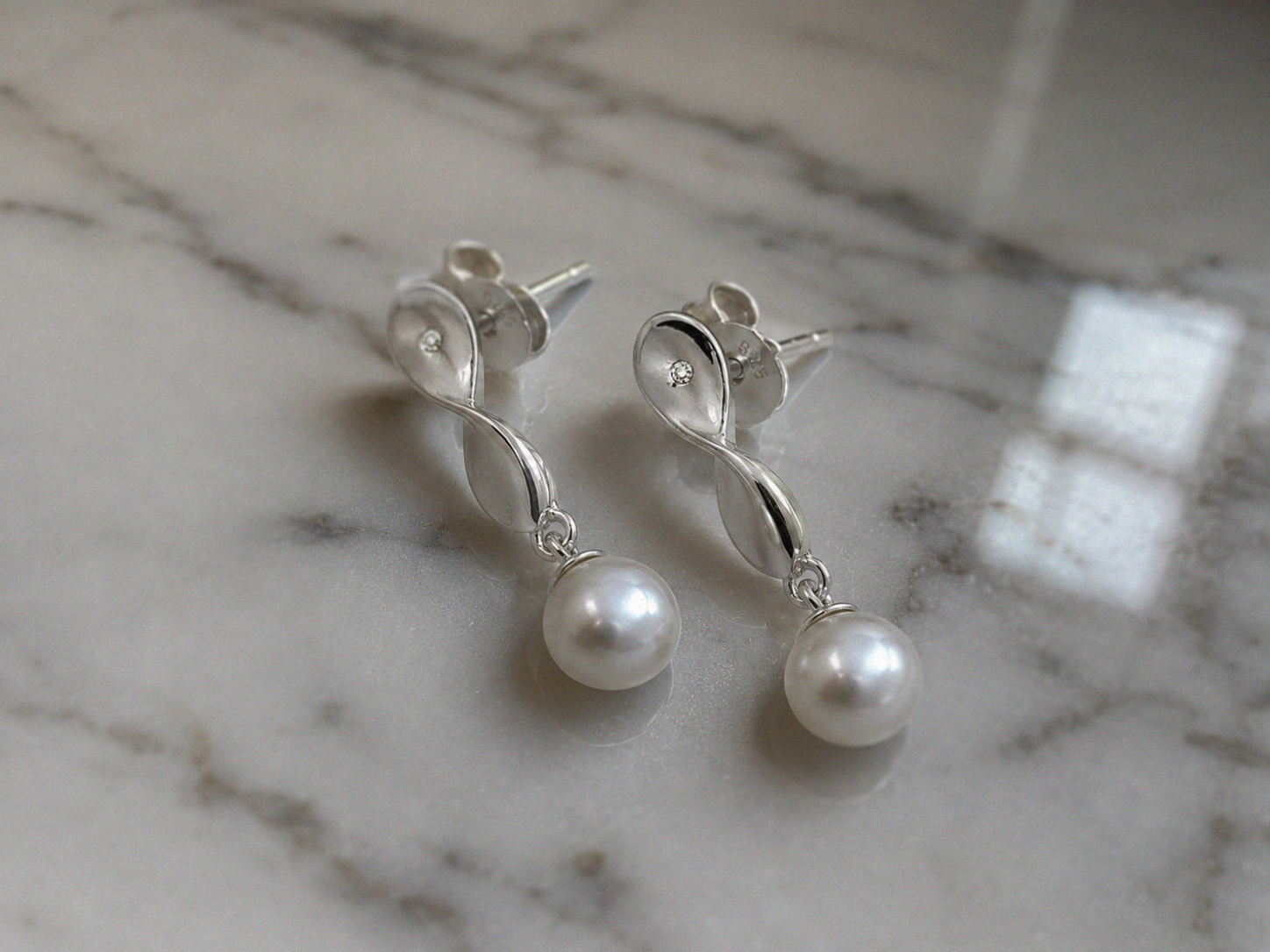 Sterling Silver Twisted Pear Drop Earrings