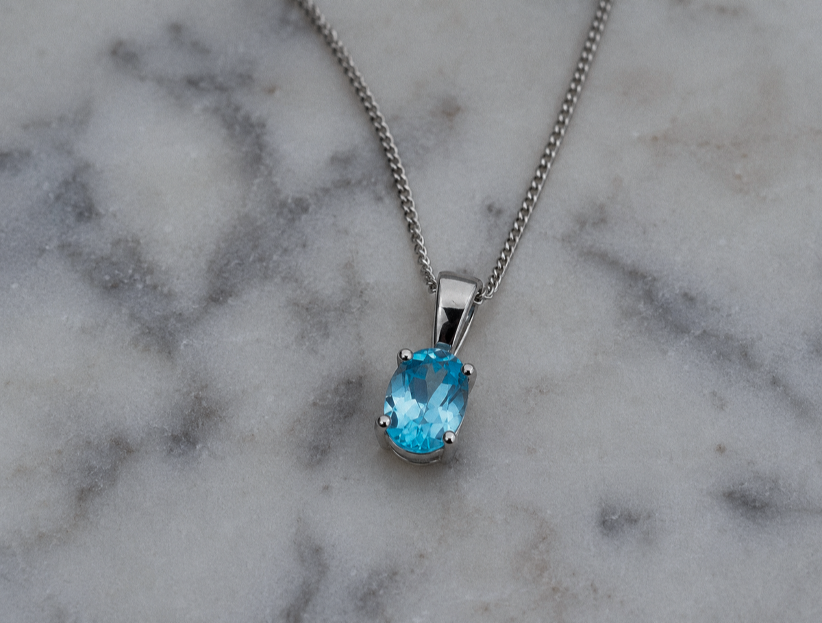 9ct White Gold Swiss Blue Topaz Oval Pendant Necklace