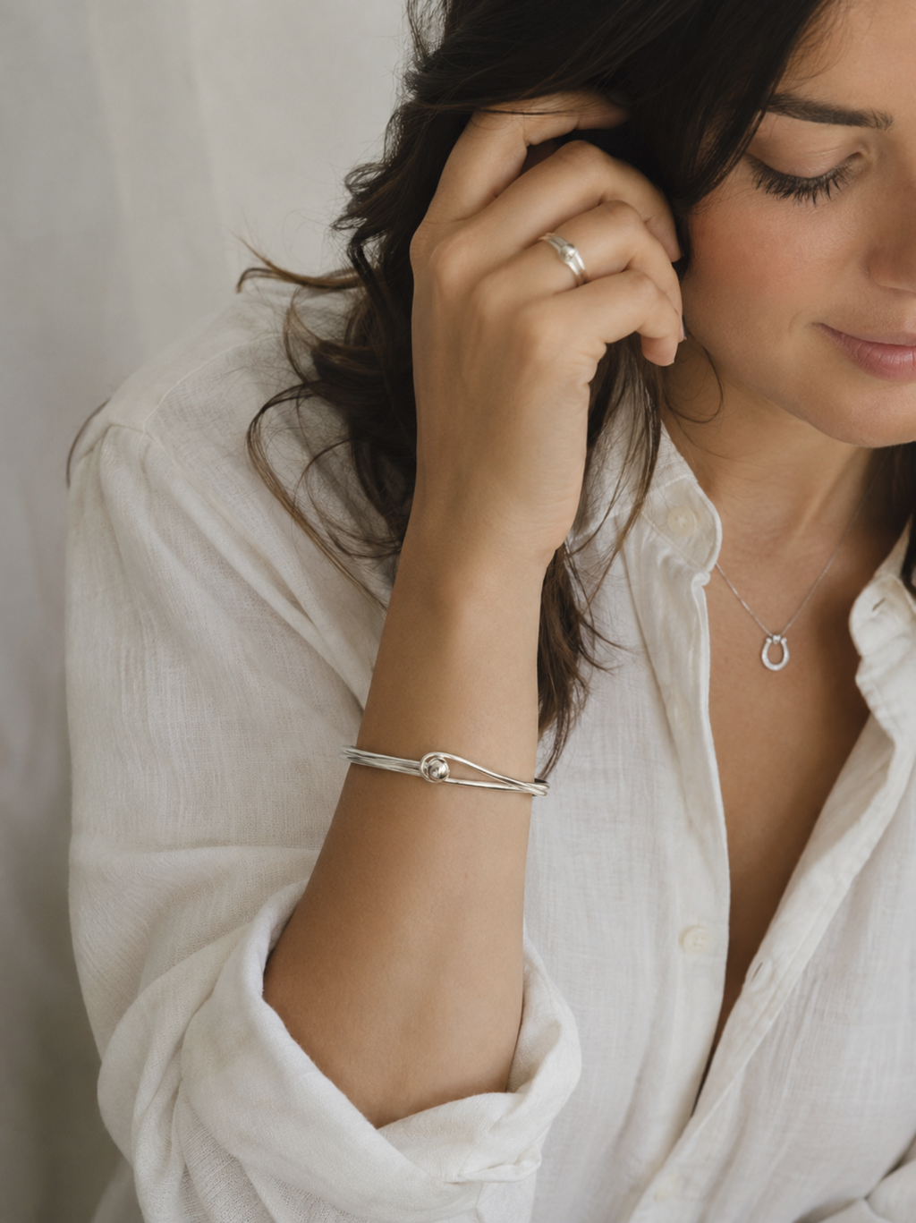 Sterling Silver Oval Bangle with Feature Ball Clasp Sterling Silver Oval Bangle with Feature Ball Clasp