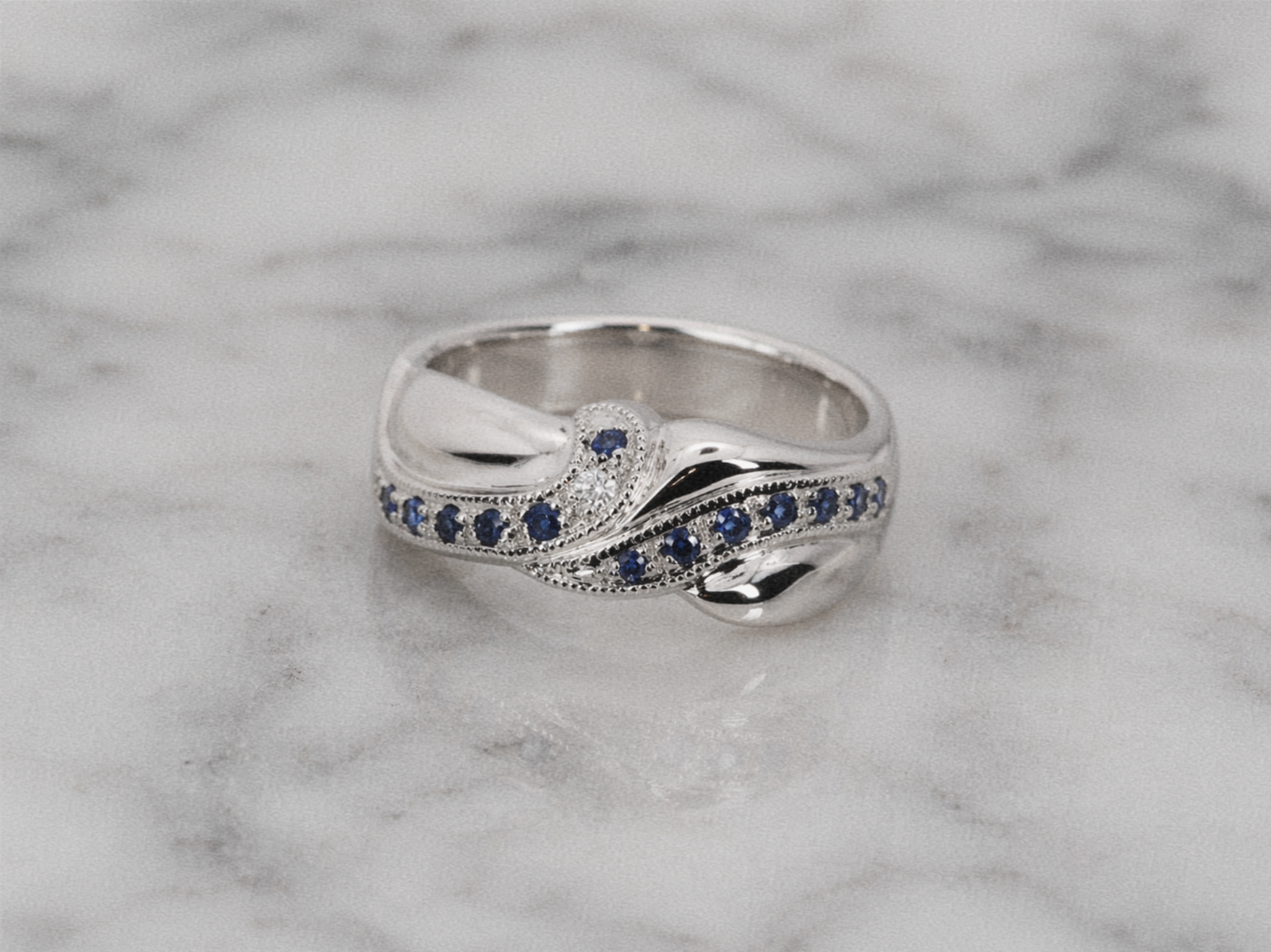 9ct White Gold Blue Sapphire & Diamond Twist Eternity Ring