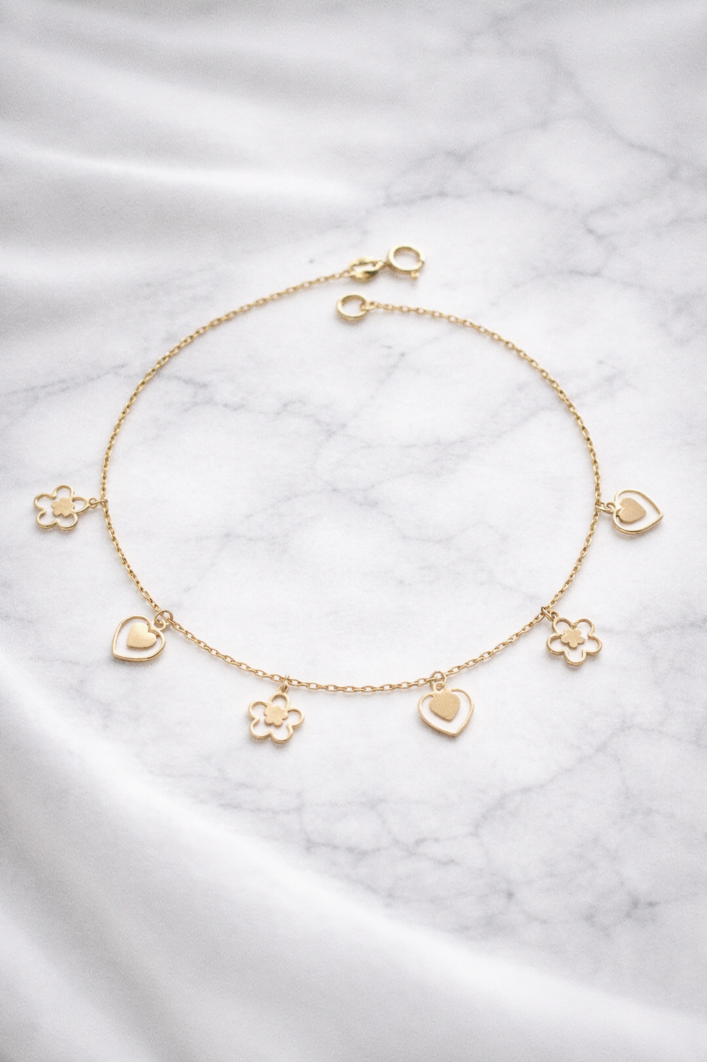 9ct Gold Heart & Flower Charm Bracelet - Delicate Charm Bracelet in Yellow Gold.