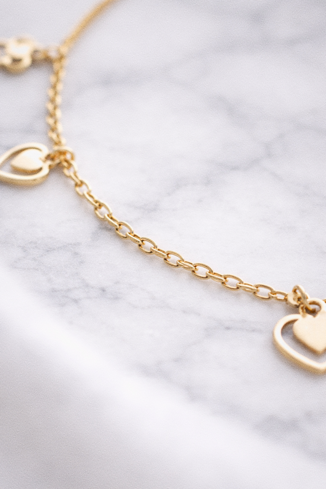 9ct Gold Heart & Flower Charm Bracelet - Delicate Charm Bracelet in Yellow Gold.