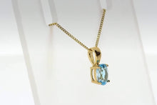9ct Yellow Gold Swiss Blue Topaz Oval Pendant Necklace